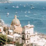 Amalfi coast image with a church and yachts in the view