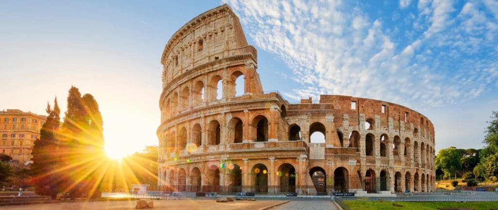 Colosseum in Rome and morning sun, Italy.