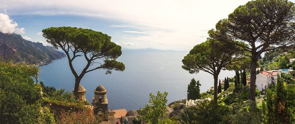 A breathtaking view of Ravello, Italy, known for its panoramic vistas of the Amalfi Coast, ancient villas, and lush gardens, offering a serene and romantic retreat for visitors. Perfect travel destination along the Amalfi Coast.