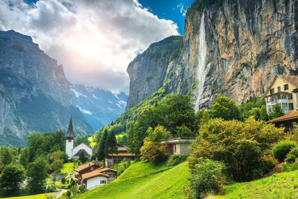 Fabulous mountain village with high cliffs and waterfalls, Lauterbrunnen