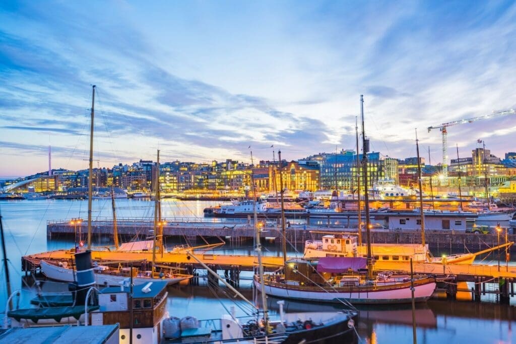 Oslo city, Oslo port with boats and yachts at twilight